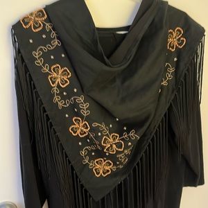 Intricate pattern of beading on this stunning triangular shaped scarf